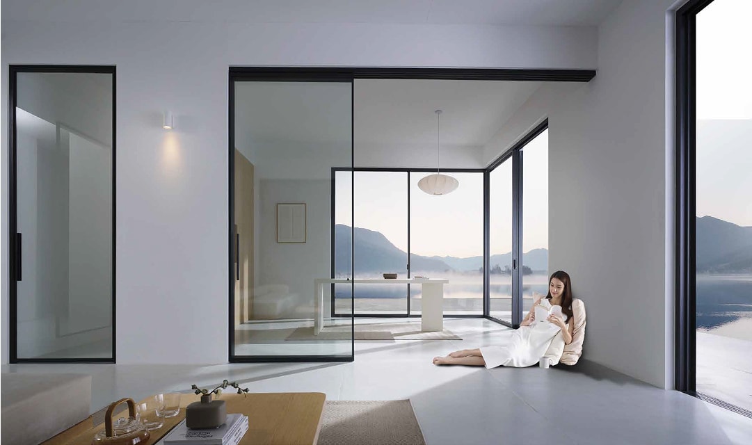 Minimal interior with a large picture window overlooking mountains